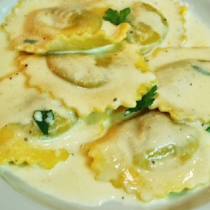 Spinach and Fontina Cream Sauce over Ravioli – Antonio's Restaurants